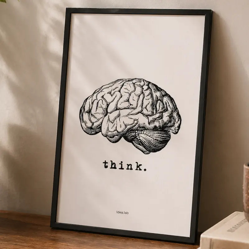 poster thinl appoggiato al muro con cornice stampa nera
